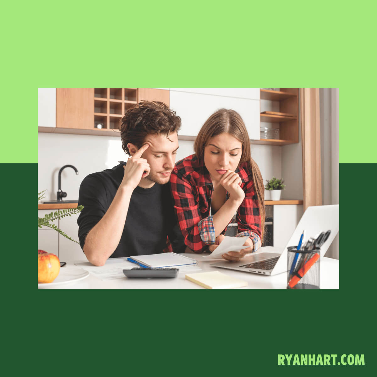 Couple reviewing budget