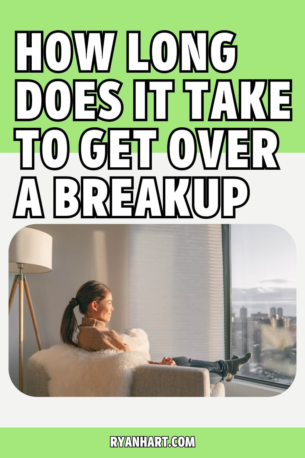 Woman sitting on couch looking out window