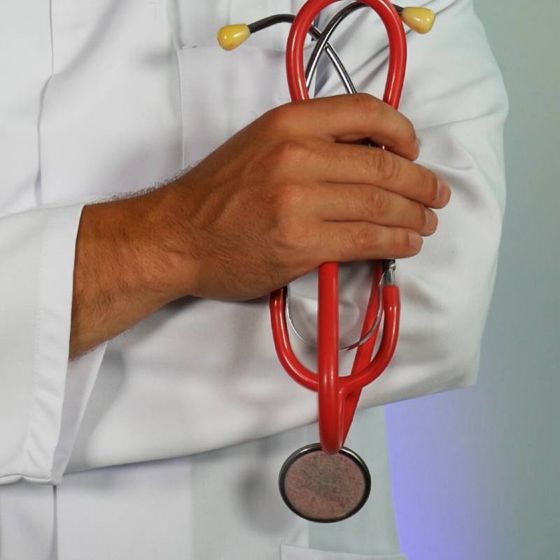 Doctor Holding Stethoscope