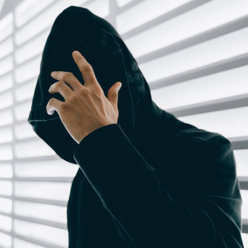 Man Wearing Black Hoodie