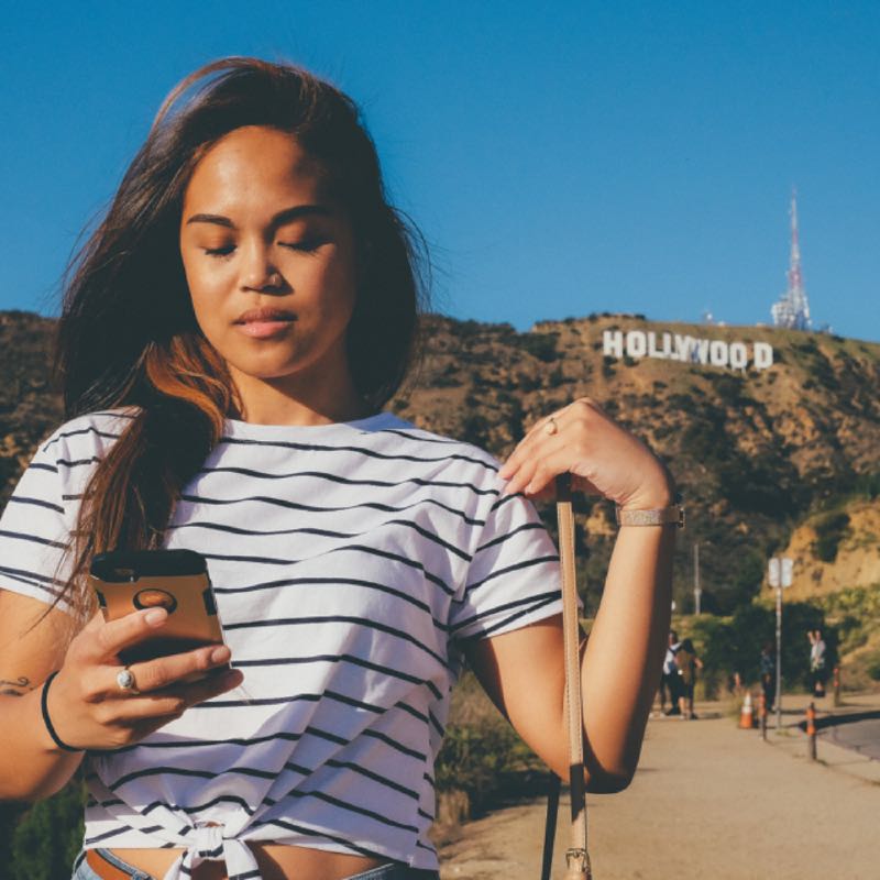 Woman in front of Hollywood sign